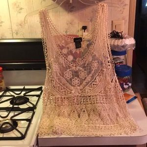 Crocheted crop top. See-thru.